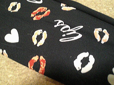 ５７）777円くちびる柄レギンス