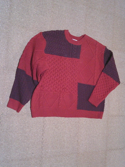 186)999円赤のデザインセーター